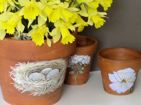 Nature art painted pots.